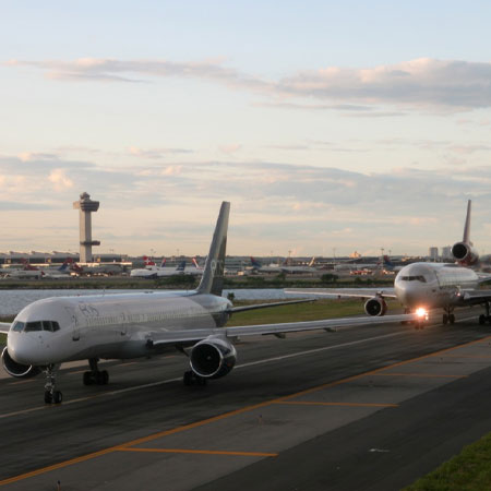Two Airplanes taking off on run way from John-F.-Kennedy-International-(JFK)