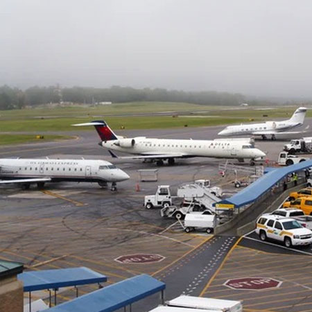 Airplanes standing on runways of Westchester-County-(HPN)